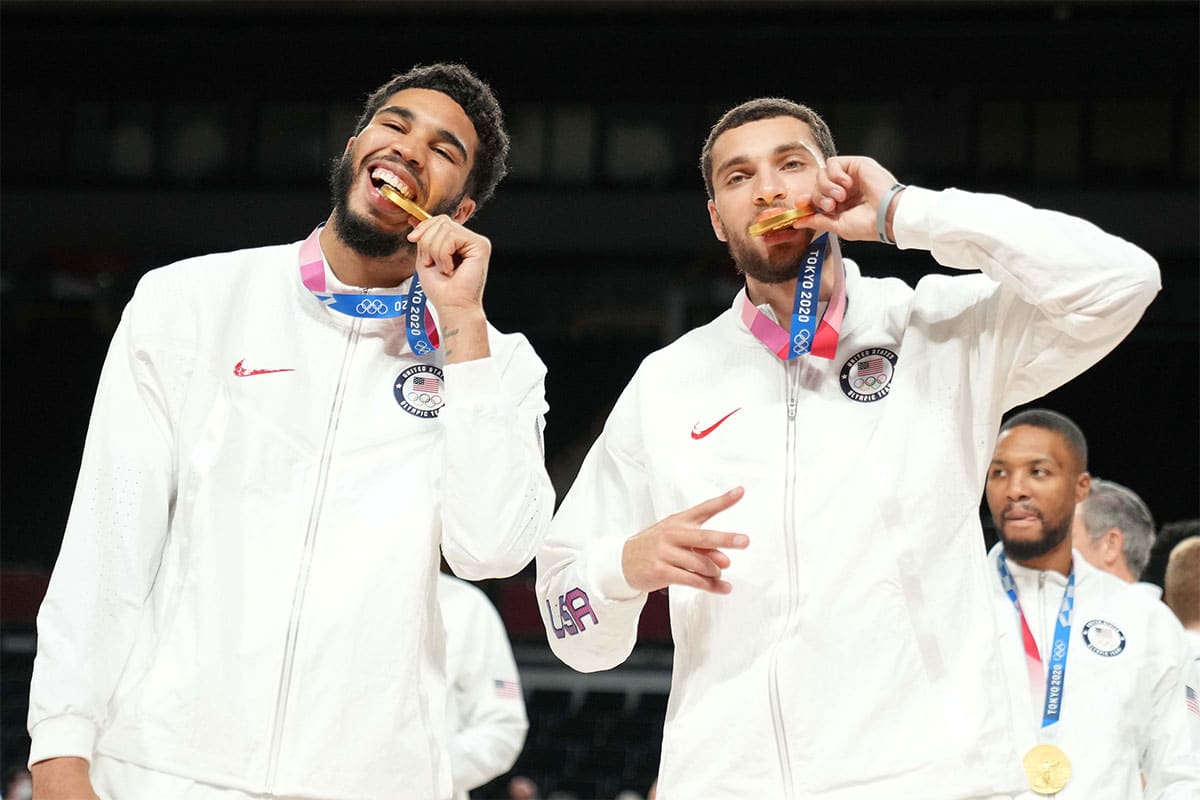 United States Zachary Lavine (right) and United States Jayson Tatum (left) celebrate with their goal medals during the Tokyo 2020 Olympic Summer Games at Saitama Super Arena.