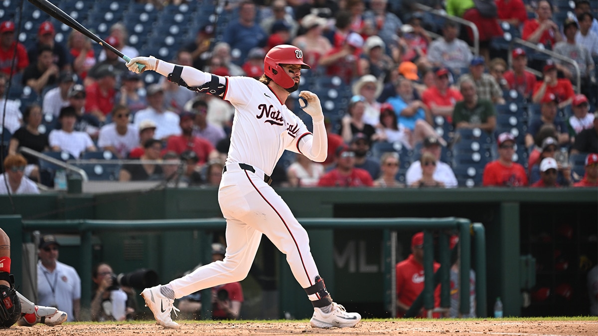 Jul 8, 2024; Washington, District of Columbia, USA; Washington Nationals left fielder Jesse Winker (6) watches the ball after hitting it into play against the St. Louis Cardinals during the fourth inning at Nationals Park. 