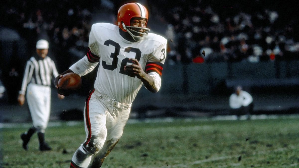 Cleveland Browns running back (32) Jim Brown in action at Cleveland Stadium.