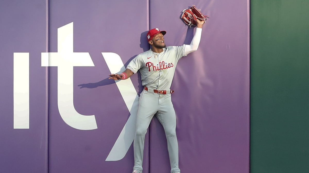 Philadelphia Phillies center fielder Johan Rojas (18) catches a ball at the wall to retire Pittsburgh Pirates second baseman Nick Gonzales (not pictured) during the fourth inning at PNC Park.