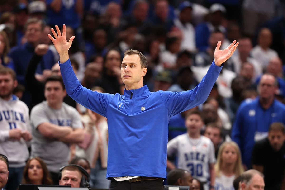Duke Blue Devils head coach Jon Scheyer reacts in the second half against the North Carolina State Wolfpack in the finals of the South Regional of the 2024 NCAA Tournament at American Airline Center.