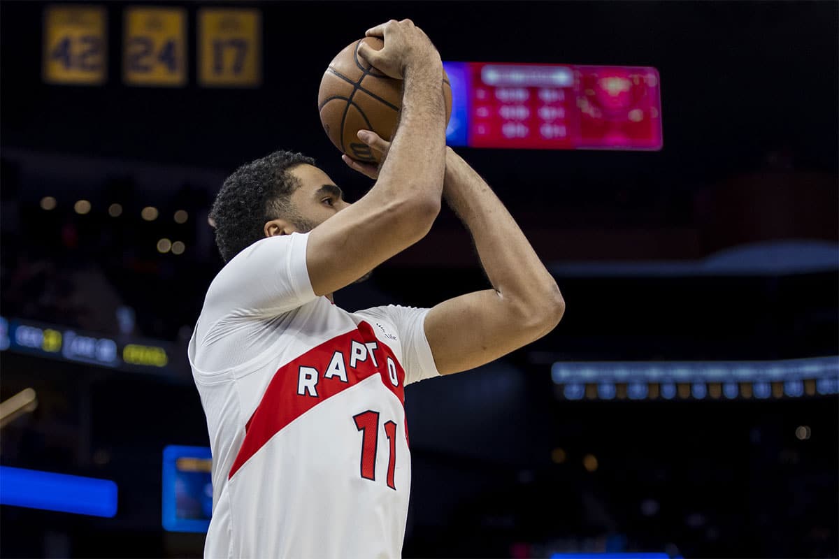 Toronto Raptors forward Jontay Porter (11) takes a three-point shot against the Golden State Warriors during the second half at Chase Center.