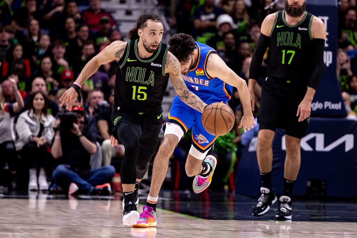 New Orleans Pelicans guard Jose Alvarado (15) brings the ball up court against Oklahoma City Thunder forward Chet Holmgren (7) during the first half of game four of the first round for the 2024 NBA playoffs at Smoothie King Center