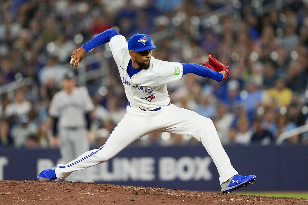 Jun 29, 2024; Toronto, Ontario, CAN; Toronto Blue Jays pitcher Jose Cuas (74) pitches against the New York Yankees during the ninth inning at Rogers Centre. 