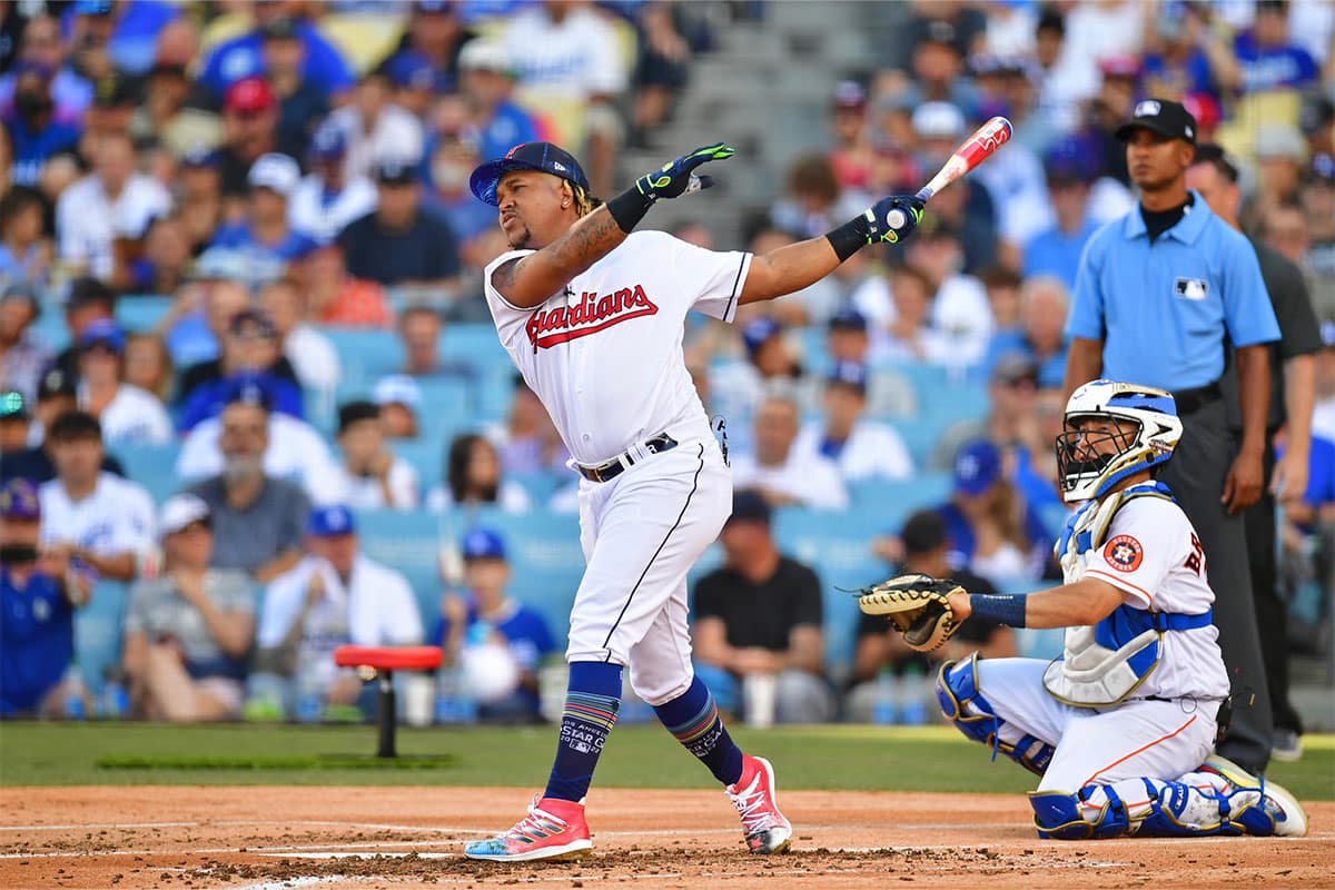 Cleveland Guardians third baseman Jose Ramirez (11) hits in the first round during the 2022 Home Run Derby at Dodgers Stadium.