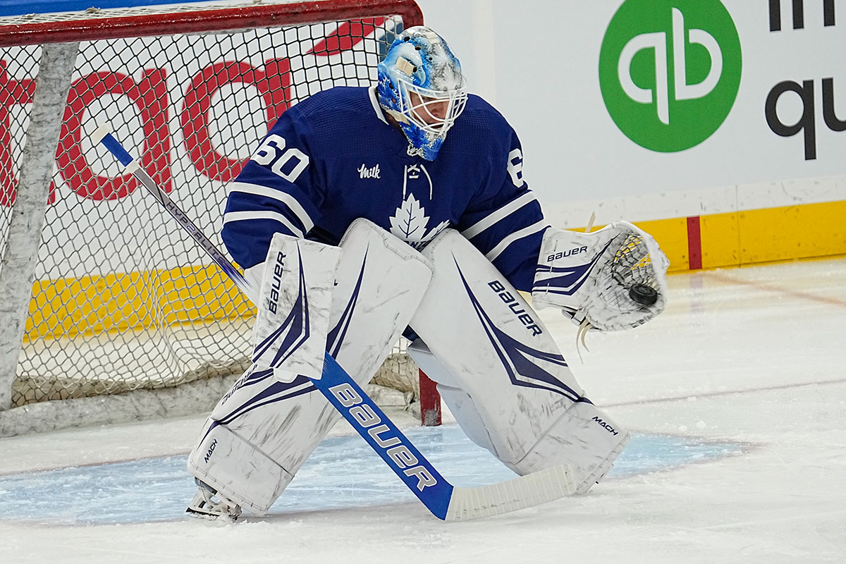 Toronto Maple Leafs goaltender Joseph Woll (60) makes a glove save during the warm up before a game against the Tampa Bay Lightning at Scotiabank Arena
