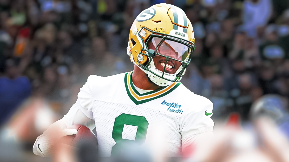 Green Bay Packers star Josh Jacobs in front of Lambeau Field.