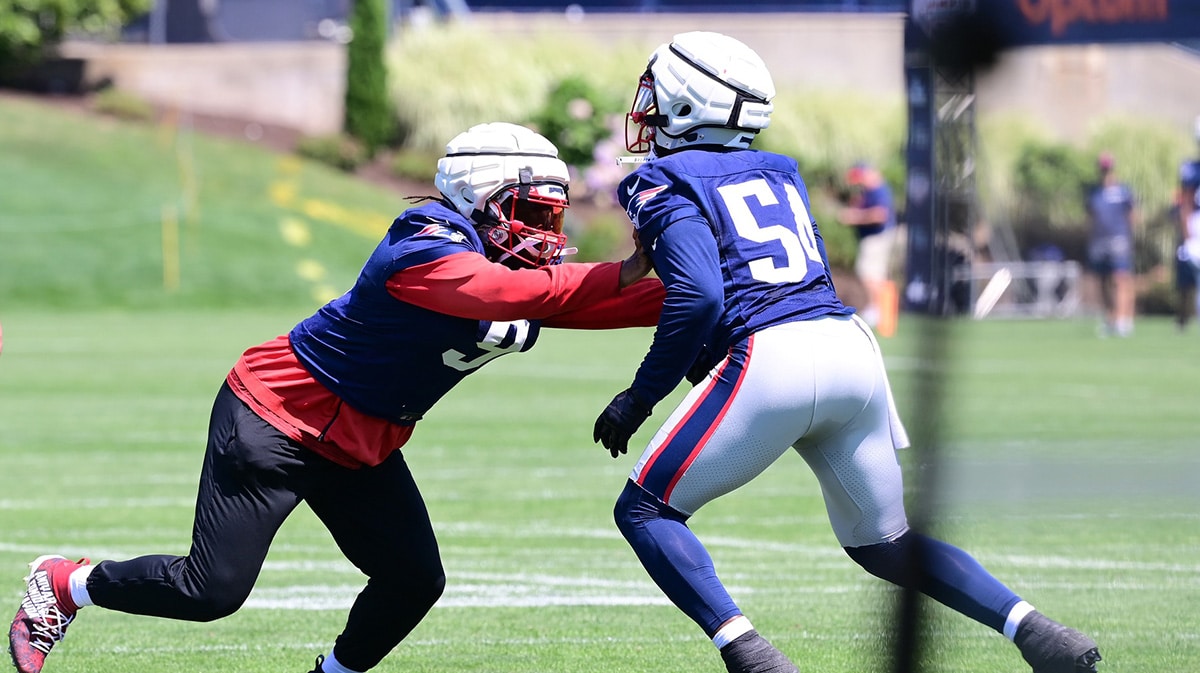 Foxborough, MA, USA; New England Patriots linebacker Matthew Judon (9) participates in a drill with defensive end John Morgan (54) during training camp at Gillette Stadium. Eric Canha-USA TODAY Sports