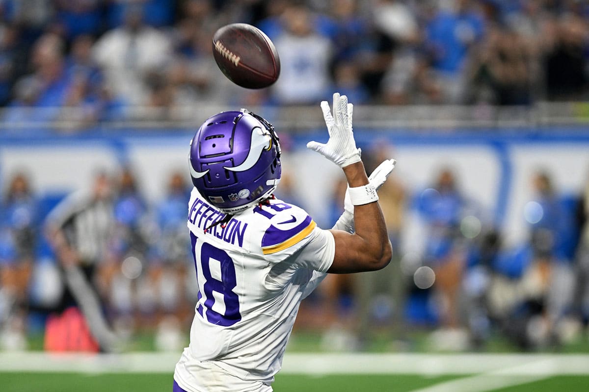 Minnesota Vikings wide receiver Justin Jefferson (18) catches a pass for a touchdown against the Detroit Lions in the third quarter at Ford Field. 