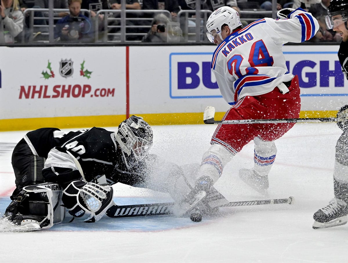  Los Angeles Kings goaltender Cal Petersen (40) makes a save off a shot on goal by New York Rangers right wing Kaapo Kakko (24) in the third period at Crypto.com Arena