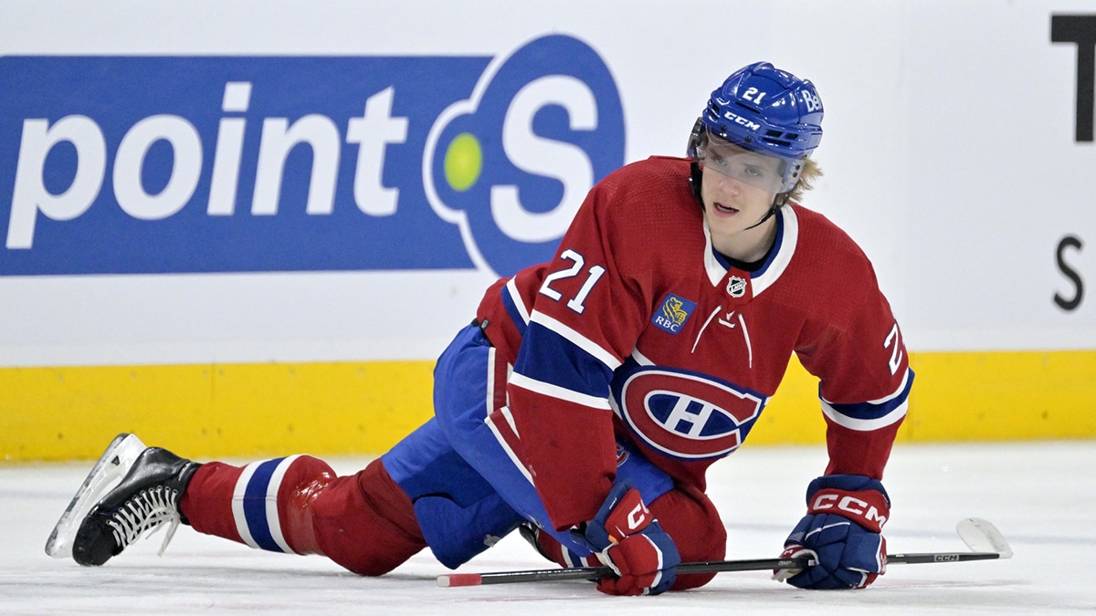 Montreal Canadiens defenseman Kaiden Guhle (21) stretches during the warmup period before the game against the Buffalo Sabres at the Bell Centre.