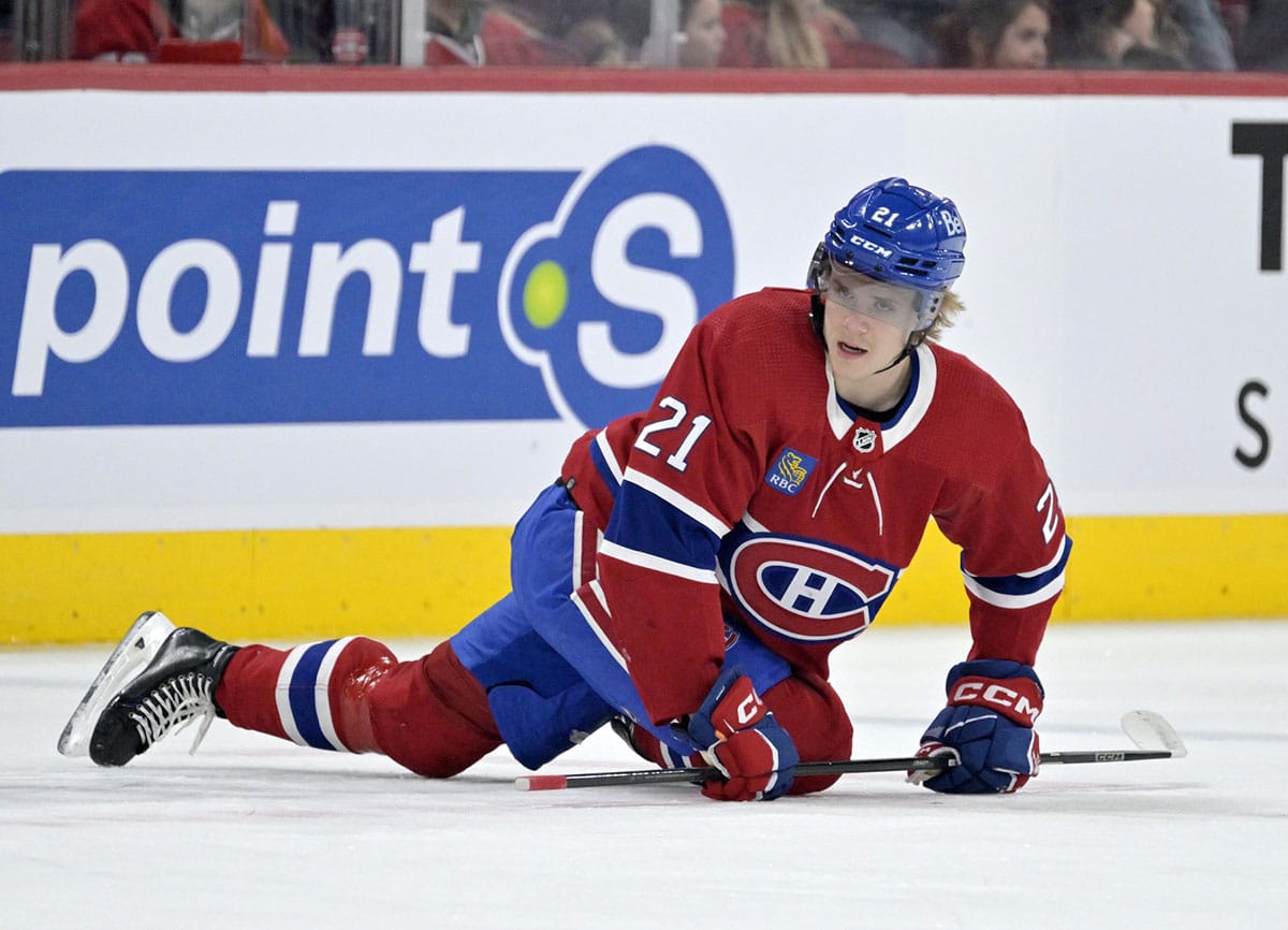 Montreal Canadiens defenseman Kaiden Guhle (21) stretches during the warmup period before the game against the Buffalo Sabres at the Bell Centre