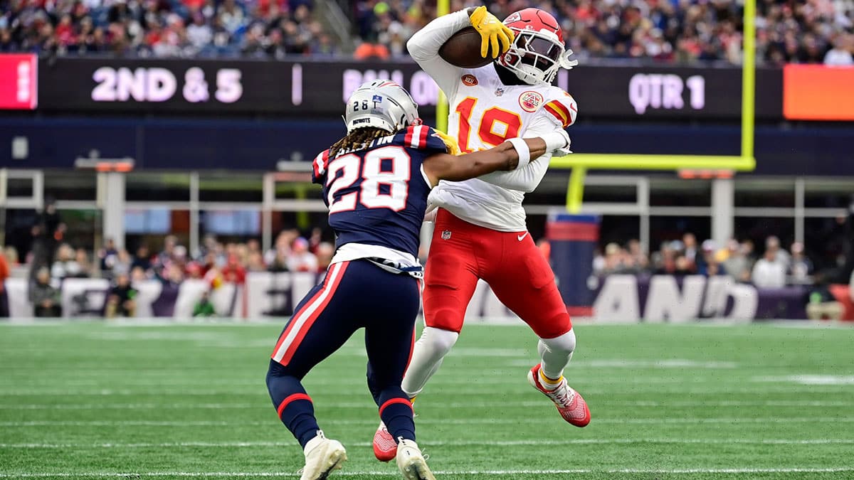 Kansas City Chiefs wide receiver Kadarius Toney (19) is tackled by New England Patriots cornerback Alex Austin (28) at Gillette Stadium.