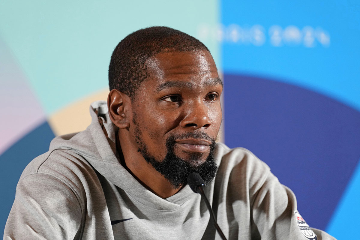 USA basketball player Kevin Durant talks to the media during a press conference.