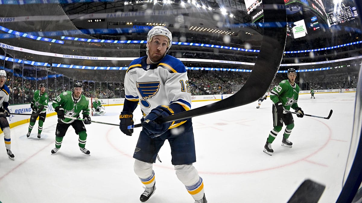 St. Louis Blues right wing Kevin Hayes (12) attempts to control the puck in the air in the Dallas Stars zone during the first period at the American Airlines Center.