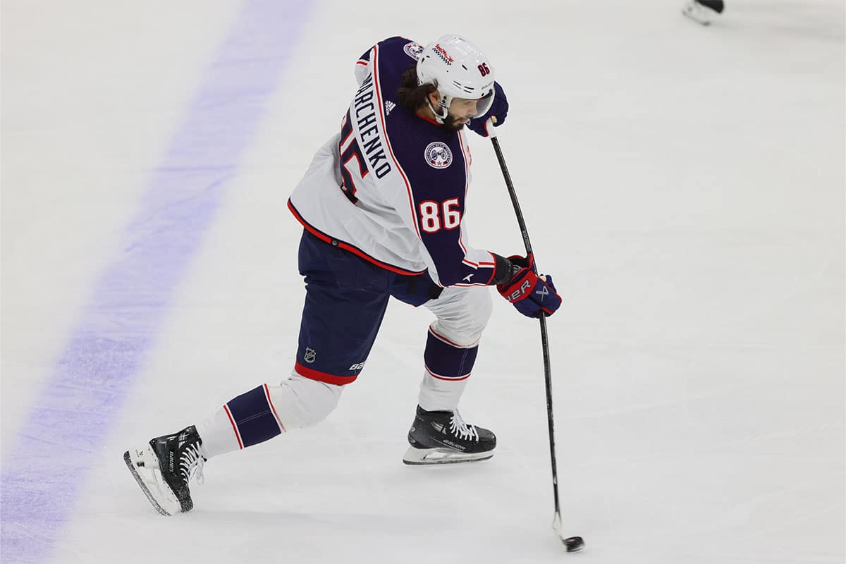 Columbus Blue Jackets right wing Kirill Marchenko (86) shoots the puck against the Florida Panthers during the first period at Amerant Bank Arena.