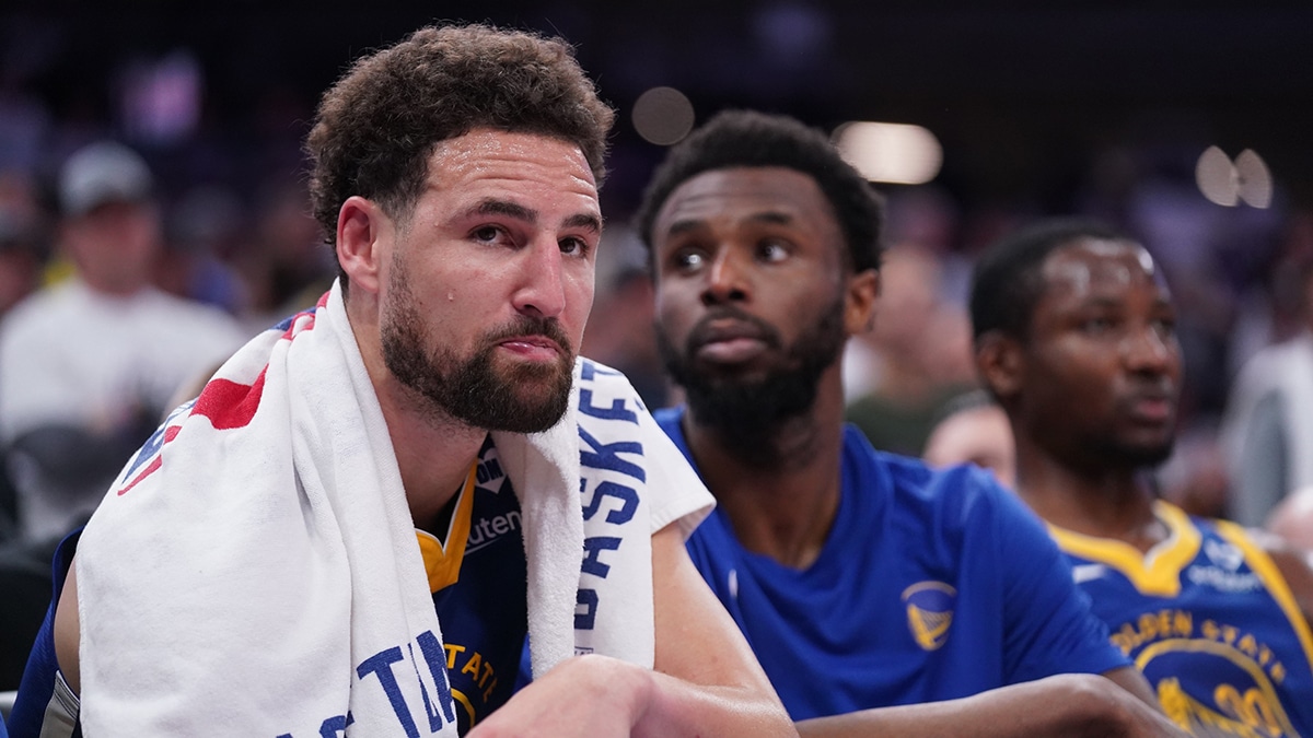 Apr 16, 2024; Sacramento, California, USA; Golden State Warriors guard Klay Thompson (11) sits on the bench during action against the Sacramento Kings in the fourth quarter during a play-in game of the 2024 NBA playoffs at the Golden 1 Center. Mandatory Credit: Cary Edmondson-USA TODAY Sports