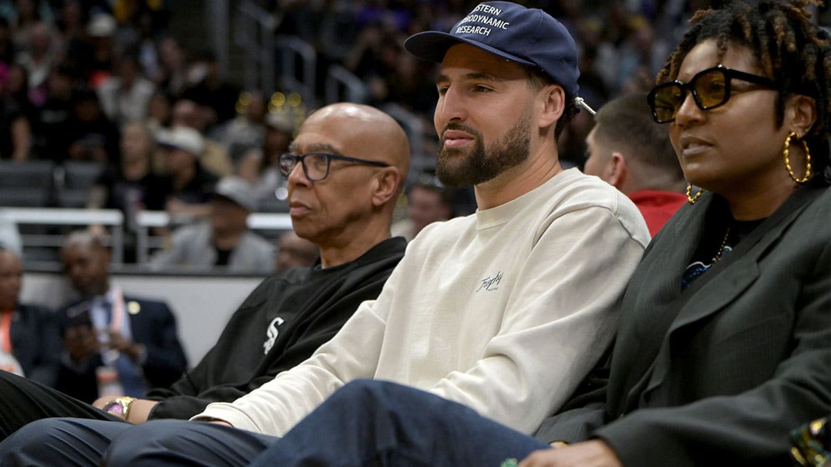 Former NBA player Mychal Thompson and his son Golden State Warriors Klay Thompson attend the game between the Los Angeles Sparks and the Indiana Fever at Crypto.com Arena.