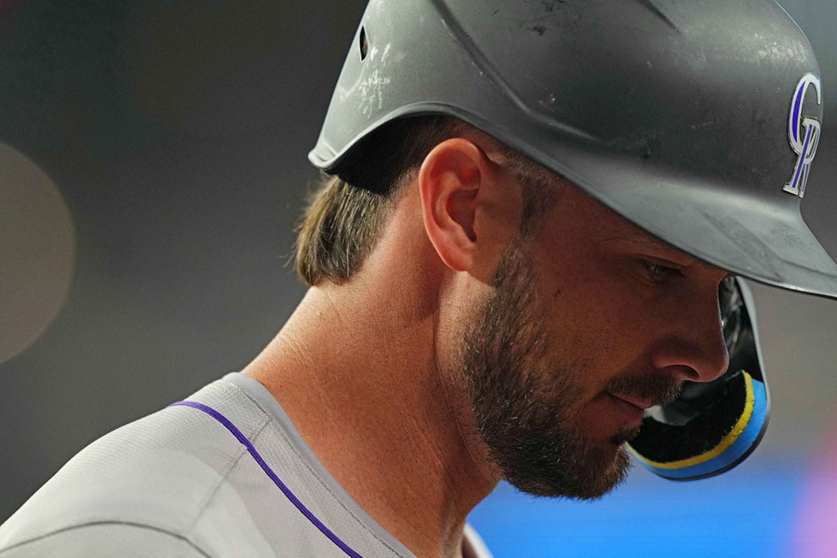 Colorado Rockies designated hitter Kris Bryant (23) reacts after striking out against the Arizona Diamondbacks during the first inning at Chase Field.