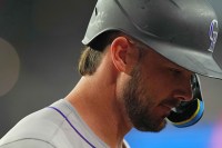Colorado Rockies designated hitter Kris Bryant (23) reacts after striking out against the Arizona Diamondbacks during the first inning at Chase Field.