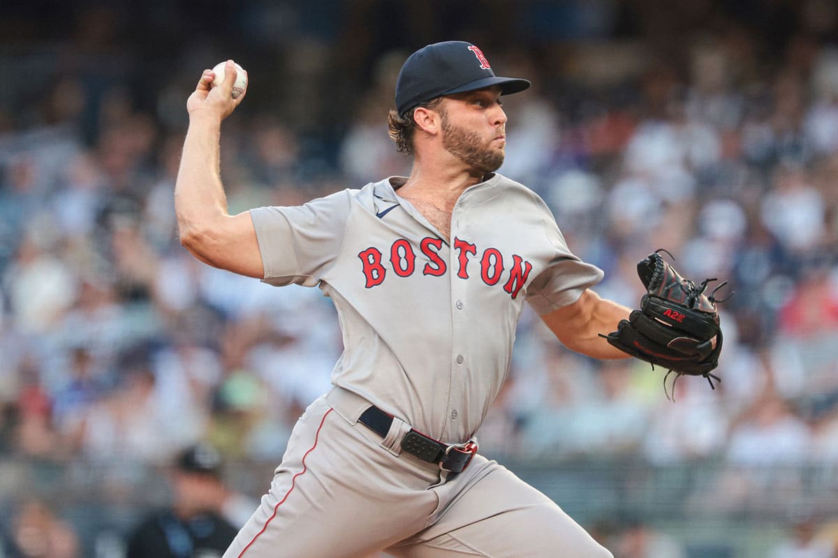 Boston Red Sox starting pitcher Kutter Crawford (50) delivers a pitch during the first inning against the New York Yankees at Yankee Stadium.