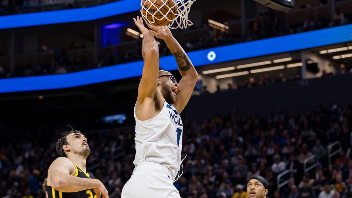 Minnesota Timberwolves forward Kyle Anderson (1) dunks the ball against Golden State Warriors forward Dario Saric (20) during the first half at Chase Center.
