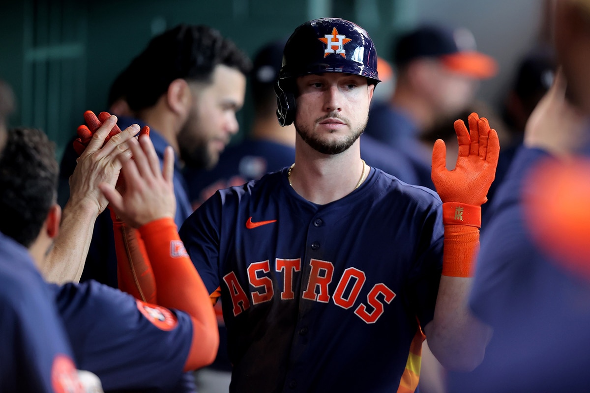 Houston Astros right fielder Kyle Tucker (30) celebrates with teammates in the dugout after hitting a home run against the Minnesota Twins during the third inning at Minute Maid Park. 