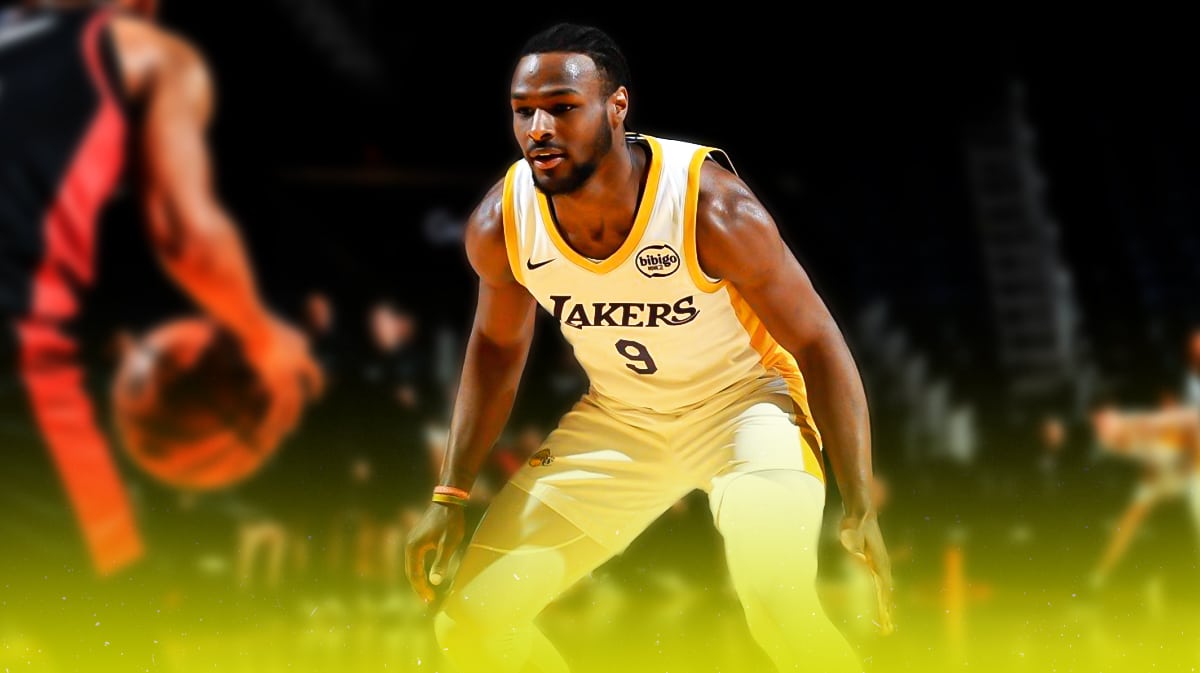 Bronny James on defense wearing Lakers Summer League jersey.