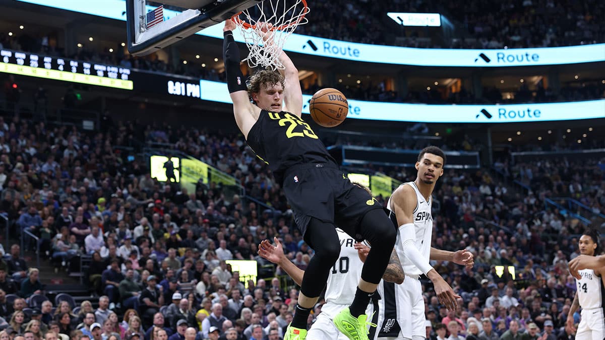 Utah Jazz forward Lauri Markkanen (23) dunks the ball against the San Antonio Spurs during the second quarter at Delta Center. 