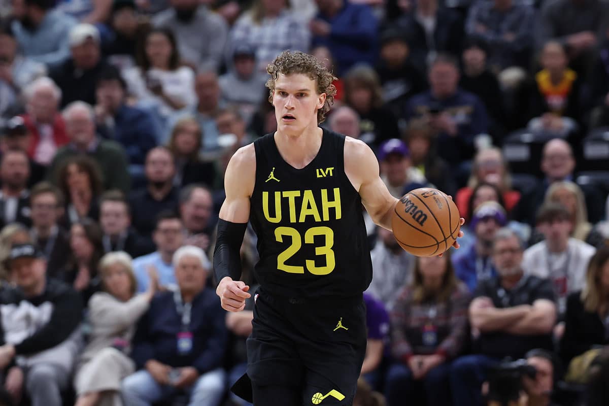 Utah Jazz forward Lauri Markkanen (23) brings the ball up the court against the San Antonio Spurs during the first quarter at Delta Center.