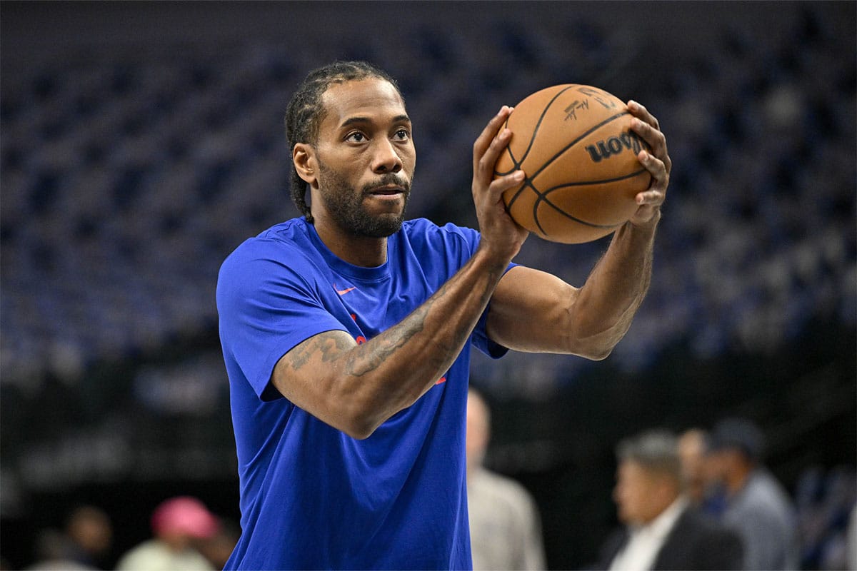 LA Clippers forward Kawhi Leonard (2) warms up before the game between the Dallas Mavericks and the LA Clippers during game three of the first round for the 2024 NBA playoffs at the American Airlines Center.