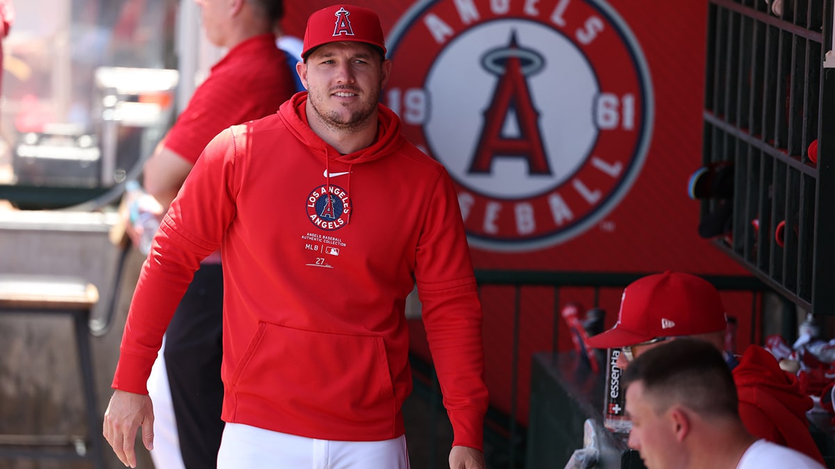 Jun 26, 2024; Anaheim, California, USA; Los Angeles Angels center fielder Mike Trout (27) walks in the dugout during the MLB game against the Oakland Athletics at Angel Stadium. Mandatory Credit: Kiyoshi Mio-USA TODAY Sports