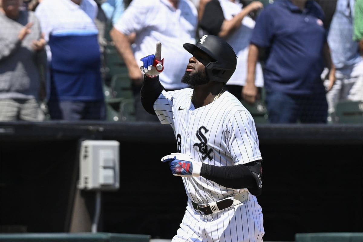 Chicago White Sox outfielder Luis Robert Jr. (88) reacts after hitting a two-run home run against the Minnesota Twins during the sixth inning at Guaranteed Rate Field. 