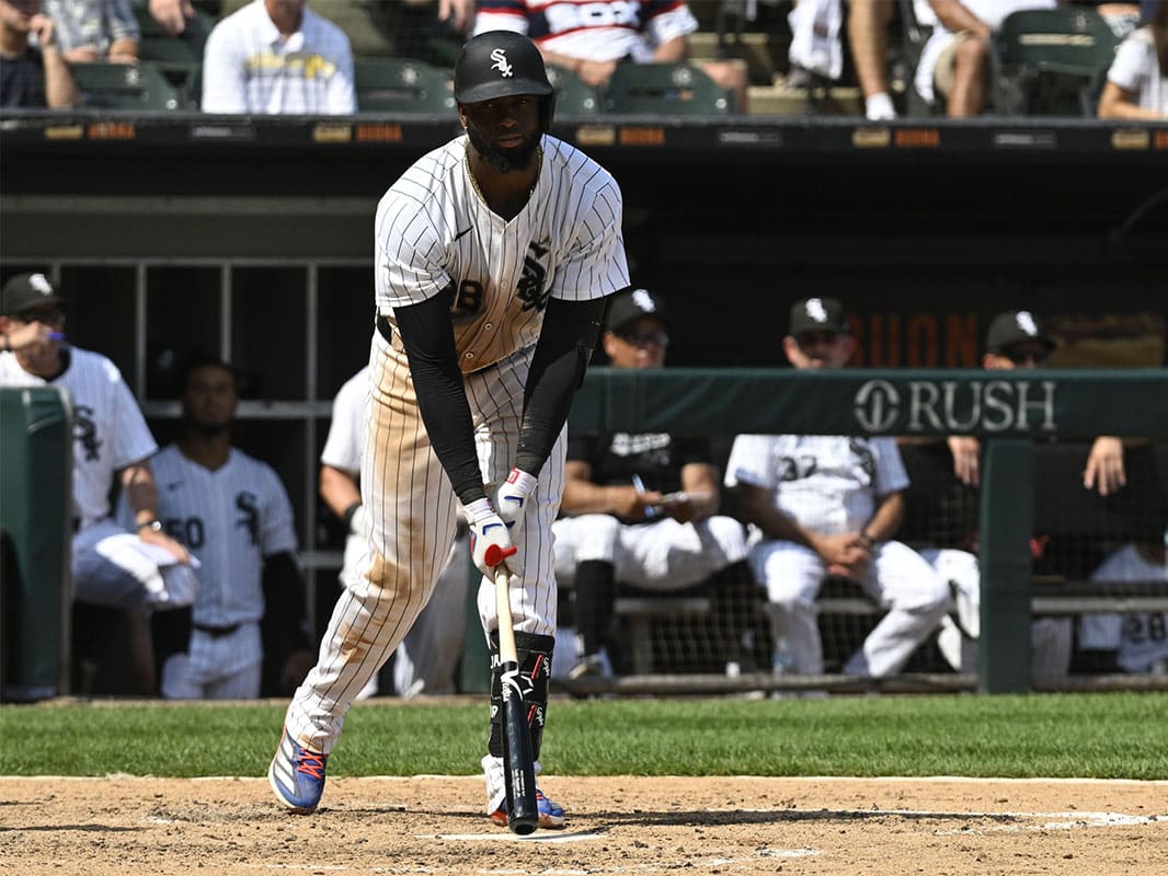 Chicago White Sox outfielder Luis Robert Jr. (88) hits his bat on the ground after striking out during the eighth inning against the Pittsburgh Pirates at Guaranteed Rate Field. 