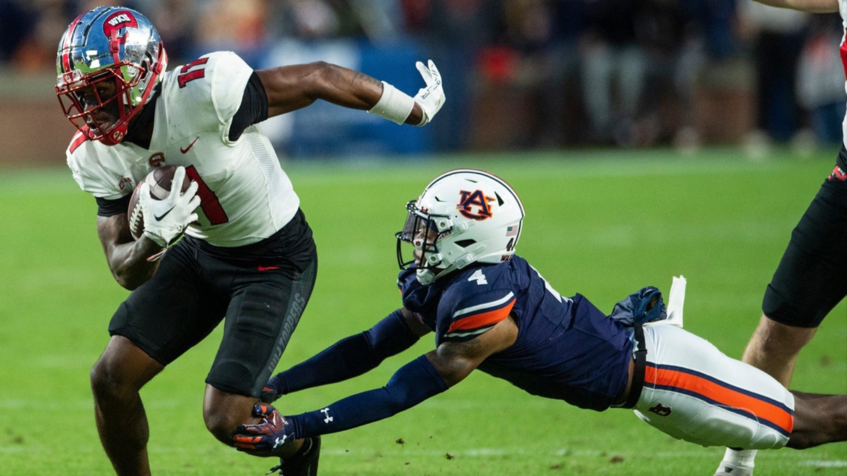 Western Kentucky Hilltoppers wide receiver Malachi Corley (11) turns up field after making a catch as Auburn Tigers take on Western Kentucky Hilltoppers at Jordan-Hare Stadium in Auburn, Ala., on Saturday, Nov. 19, 2022. Auburn Tigers and Western Kentucky Hilltoppers are tied 17-17 at halftime.