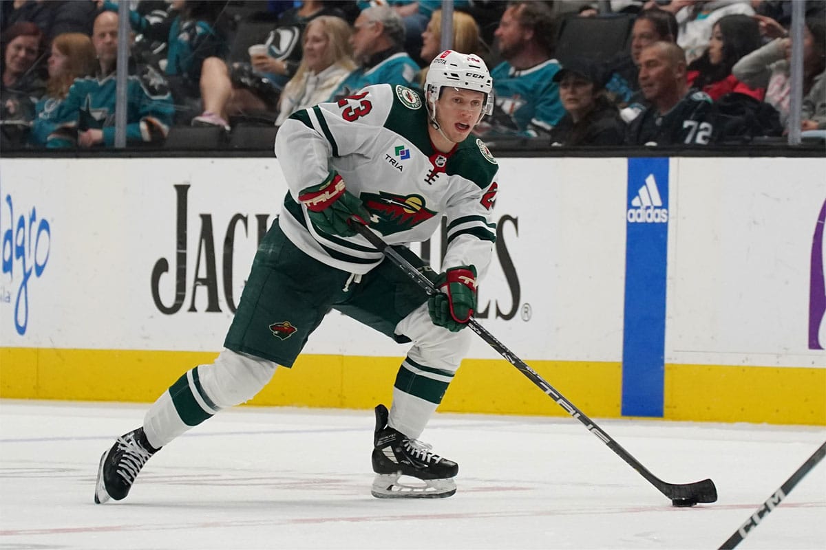 Minnesota Wild center Marco Rossi (23) controls the puck against the San Jose Sharks during the third period at SAP Center at San Jose.