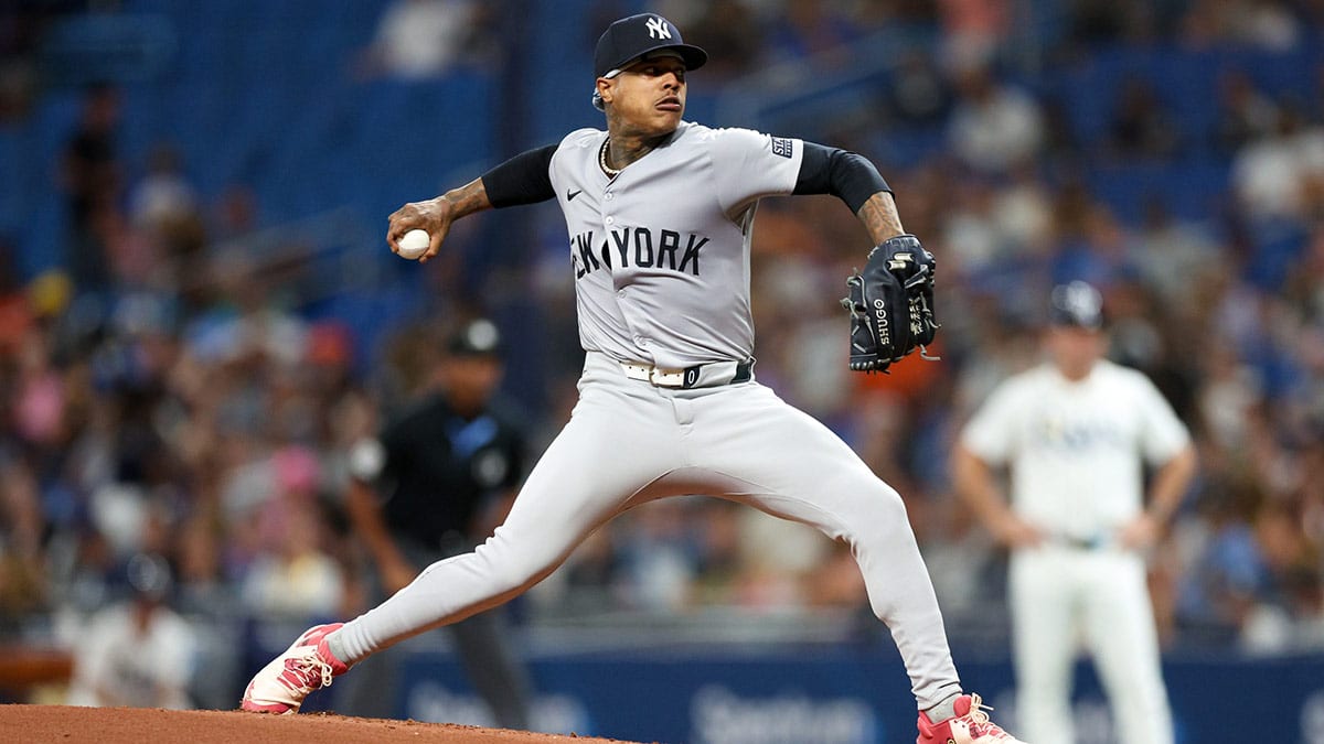 New York Yankees pitcher Marcus Stroman (0) throws a pitch against the Tampa Bay Rays in the first inning at Tropicana Field.