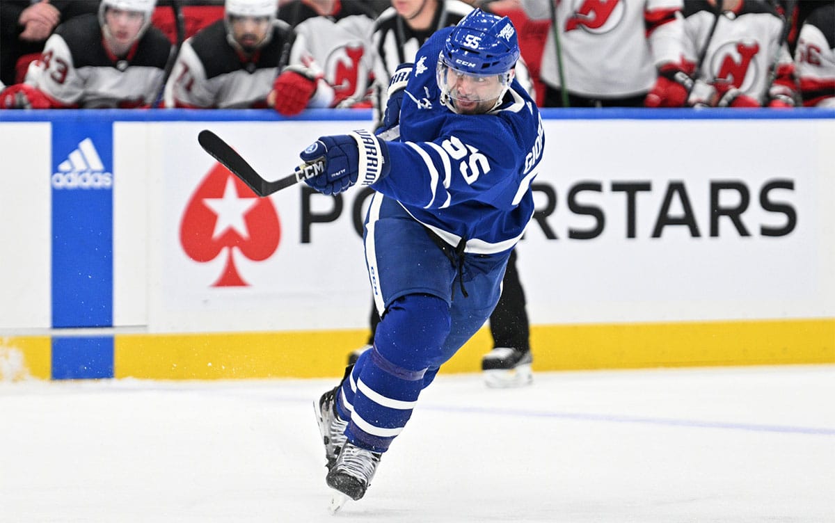 Toronto Maple Leafs defenseman Mark Giordano (55) shoots the puck against the New Jersey Devils in the first period at Scotiabank Arena. 