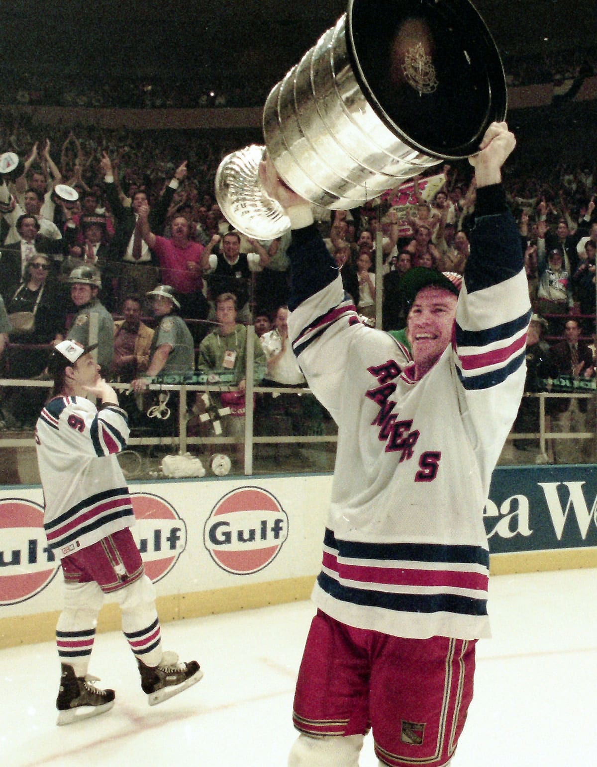 Rangers Mark Messier celebrates with the Stanley Cup after the Rangers defeated Vancouver 3-2 in game 7 of the Stanley Cup finals at Madison Square Garden June 14, 1994.