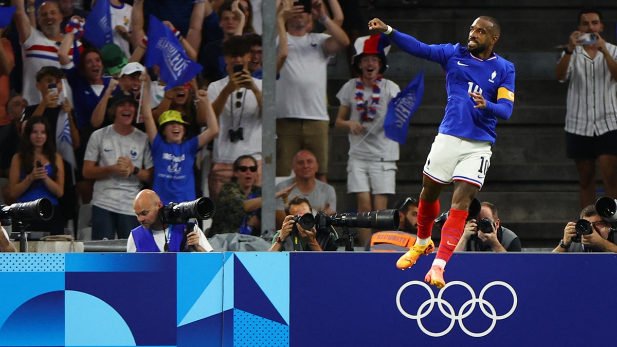 [US, Mexico & Canada customers only] Jul 24, 2024; Marseille, France; Alexandre Lacazette of France celebrates scoring their first goal against USA during a men's Group A football match during the Paris 2024 Olympic Summer Games at Orange Velodrome. Mandatory Credit: Luisa Gonzalez/Reuters via USA TODAY Sports