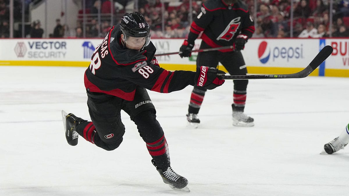 Carolina Hurricanes center Martin Necas (88) takes a shot against the Vancouver Canucks during the first period at PNC Arena.