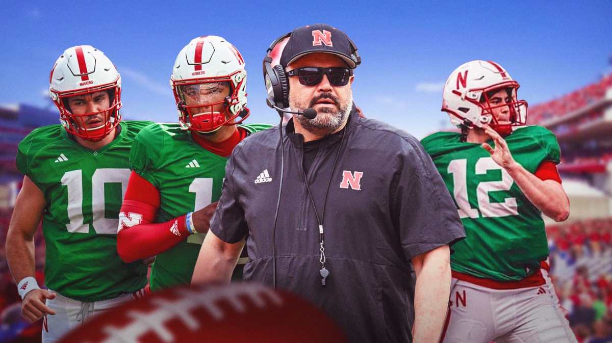 Nebraska football head coach Matt Rhule and stars Dylan Raiola, Daniel Kaelin, and Heinrich Haarberg in front of Memorial Stadium.