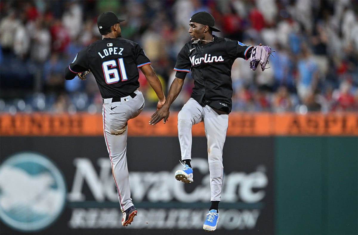 Miami Marlins outfielder Nick Gordon (1) reacts with infielder Otto Lopez (61) after the game against the Philadelphia Phillies at Citizens Bank Park. 