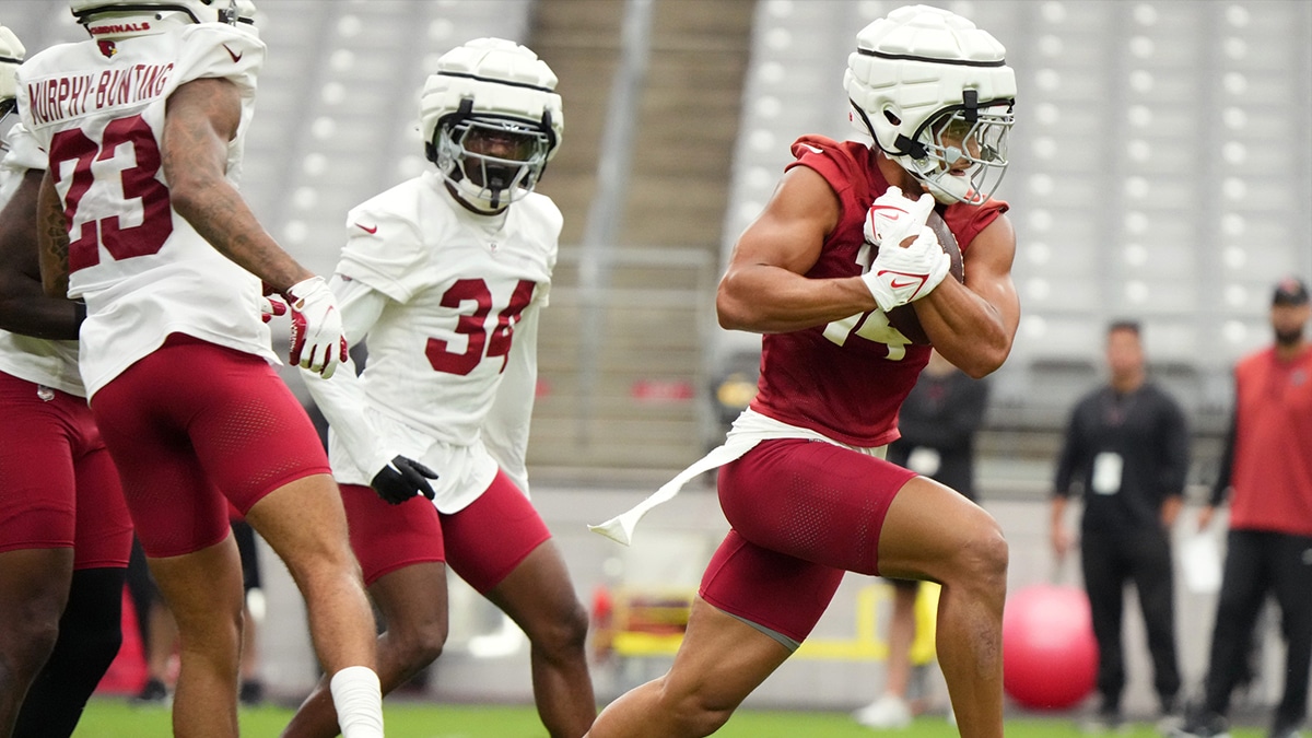 Arizona Cardinals receiver Michael Wilson (14) catches the ball during training camp at State Farm Stadium in Glendale on July 25, 2024.