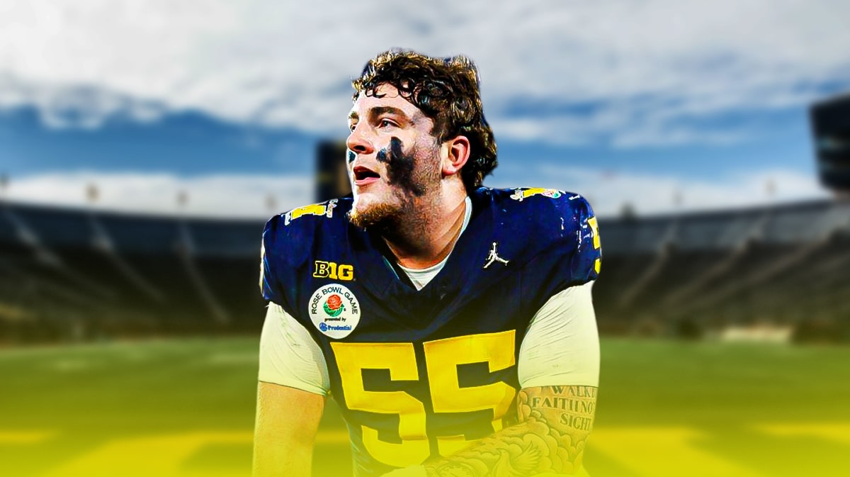Michigan football, Wolverines, Mason Graham, Mason Graham Michigan, Mason Graham PFF, Mason Graham in Michigan football uni with Michigan football stadium in the background