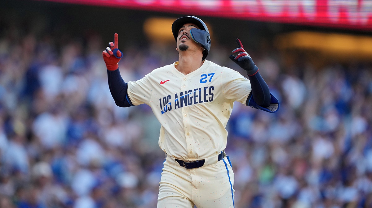 Los Angeles Dodgers left fielder Miguel Vargas (27) celebrates after hitting a home run in the eighth inning against the Milwaukee Brewers at Dodger Stadium.
