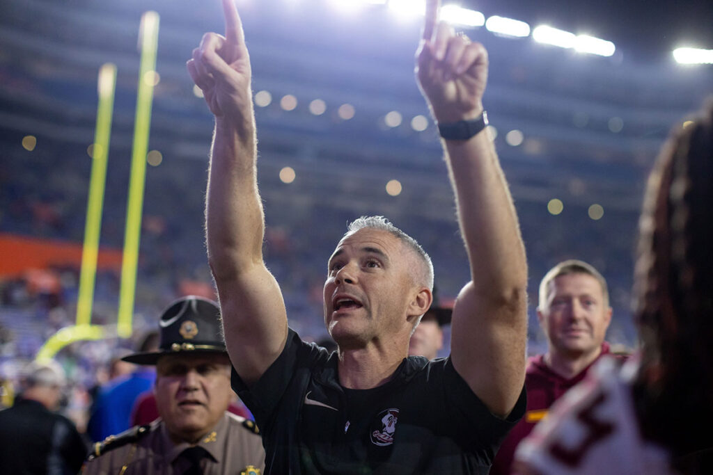 Florida State Seminoles head coach Mike Norvell gestures towards the crowd after the game against the Florida Gators at Steve Spurrier Field at Ben Hill Griffin Stadium in Gainesville, FL on Saturday