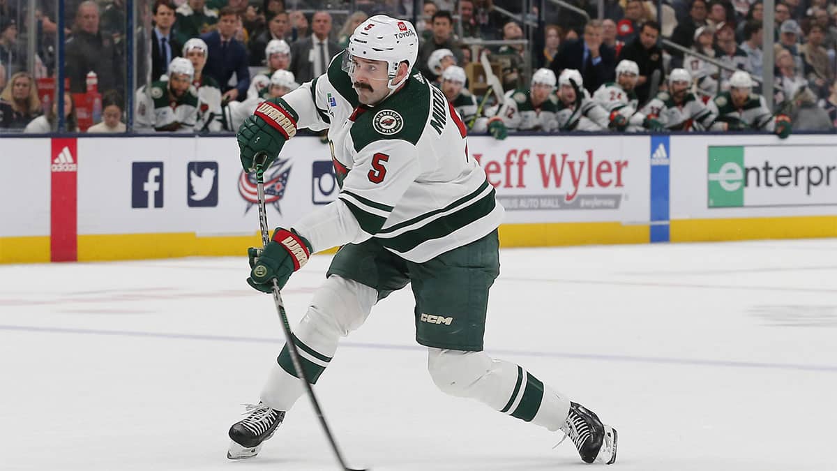 Minnesota Wild defenseman Jacob Middleton (5) wrists a shot on goal against the Columbus Blue Jackets during the first period at Nationwide Arena. 