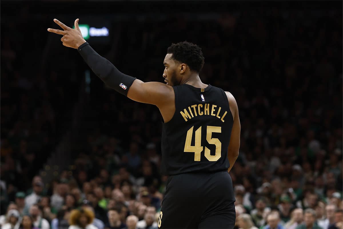 Cleveland Cavaliers guard Donovan Mitchell (45) celebrates a three point basket against the Boston Celtics during the first quarter of game one of the second round of the 2024 NBA playoffs at TD Garden. 