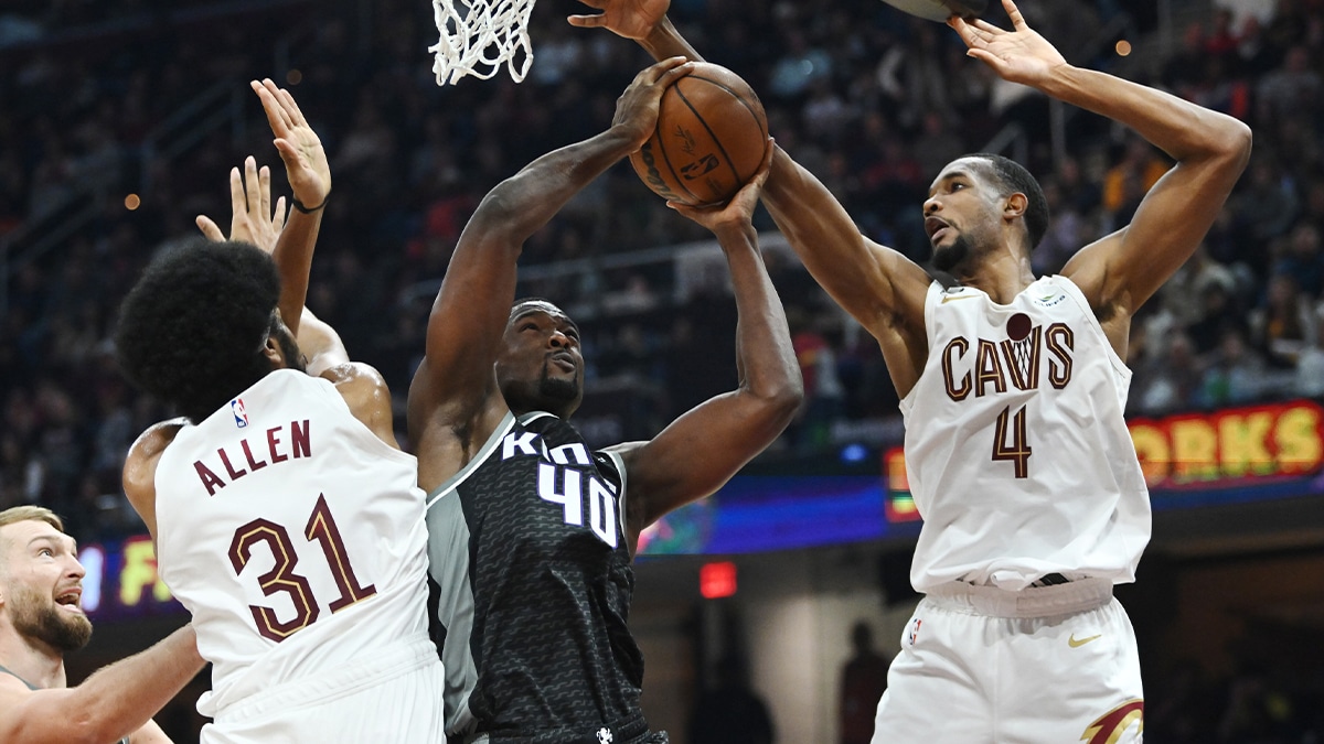 Sacramento Kings forward Harrison Barnes (40) drives to the basket between Cleveland Cavaliers center Jarrett Allen (31) and forward Evan Mobley (4) during the first half at Rocket Mortgage FieldHouse.